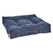 Indigo Bowsers Piazza Dog Bed in deep blue woven fabric offers a soft tufted center with supportive raised bolsters for pets