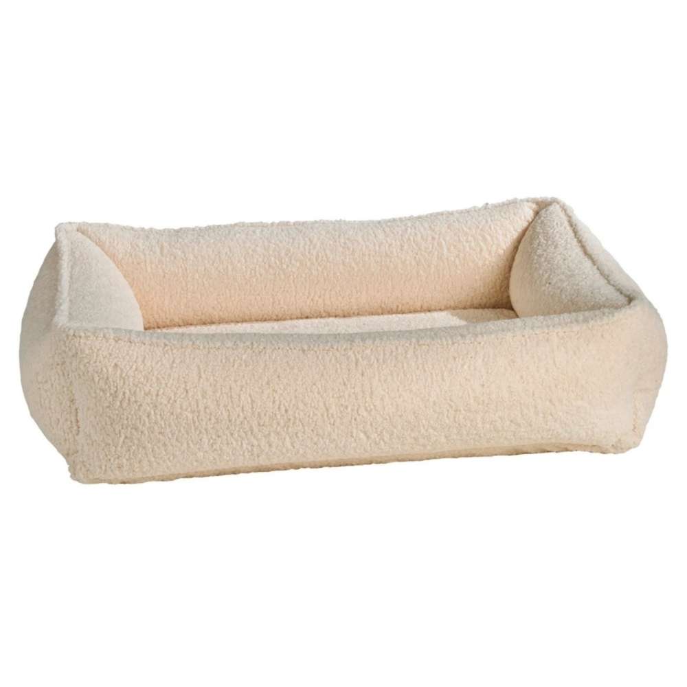 Ivory Sheepskin Bowsers Urban Lounger Dog Bed in cream plush fabric with cozy raised edges
