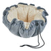 Mineral Bowsers Buttercup Dog Bed in denim-blue fabric with a cream sherpa lining and gathered circular sides