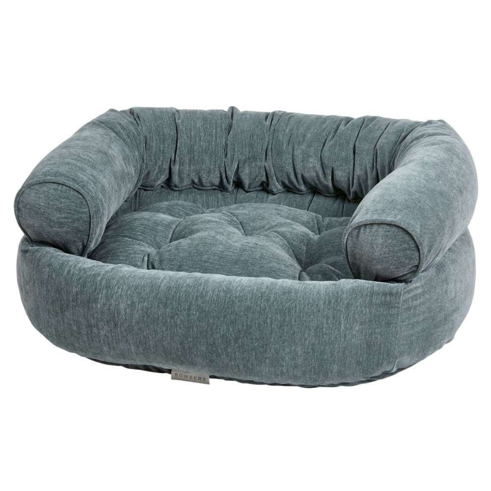 Mineral Bowsers Double Donut Bed in soft blue-gray fabric with a plush tufted cushion and supportive raised bolsters for cozy pet comfort
