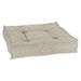 Natura Bowsers Piazza Dog Bed in soft beige herringbone fabric features a plush tufted cushion with supportive padded edges