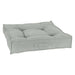 Oyster Bowsers Piazza Dog Bed in light gray fabric offers a cozy tufted center with thick cushioned bolsters for pets