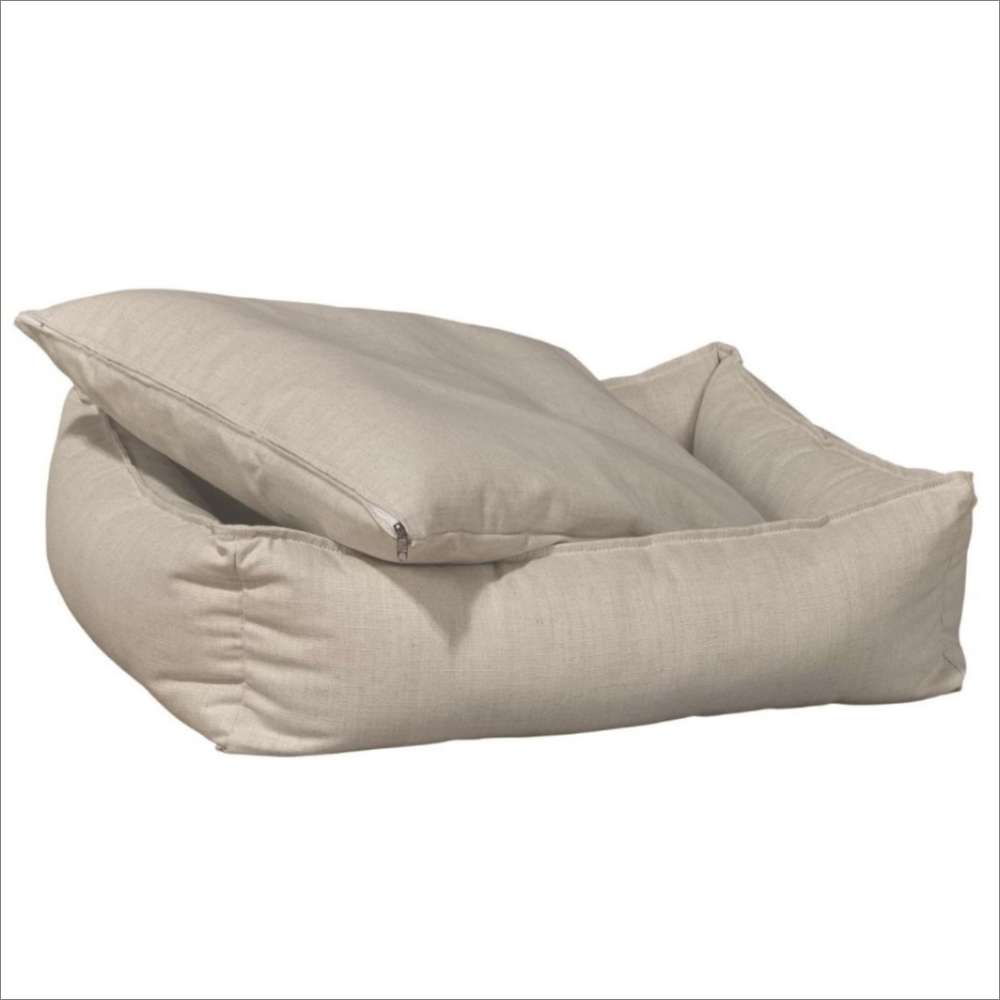 Parchment Bowsers B Lounge Dog Bed in parchment beige with a removable cushion lifted to show the interior padding