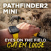 Person tracks dogs in an open field with a smartwatch, showcasing Dogtra Pathfinder2 Mini GPS E-Collar in outdoor use