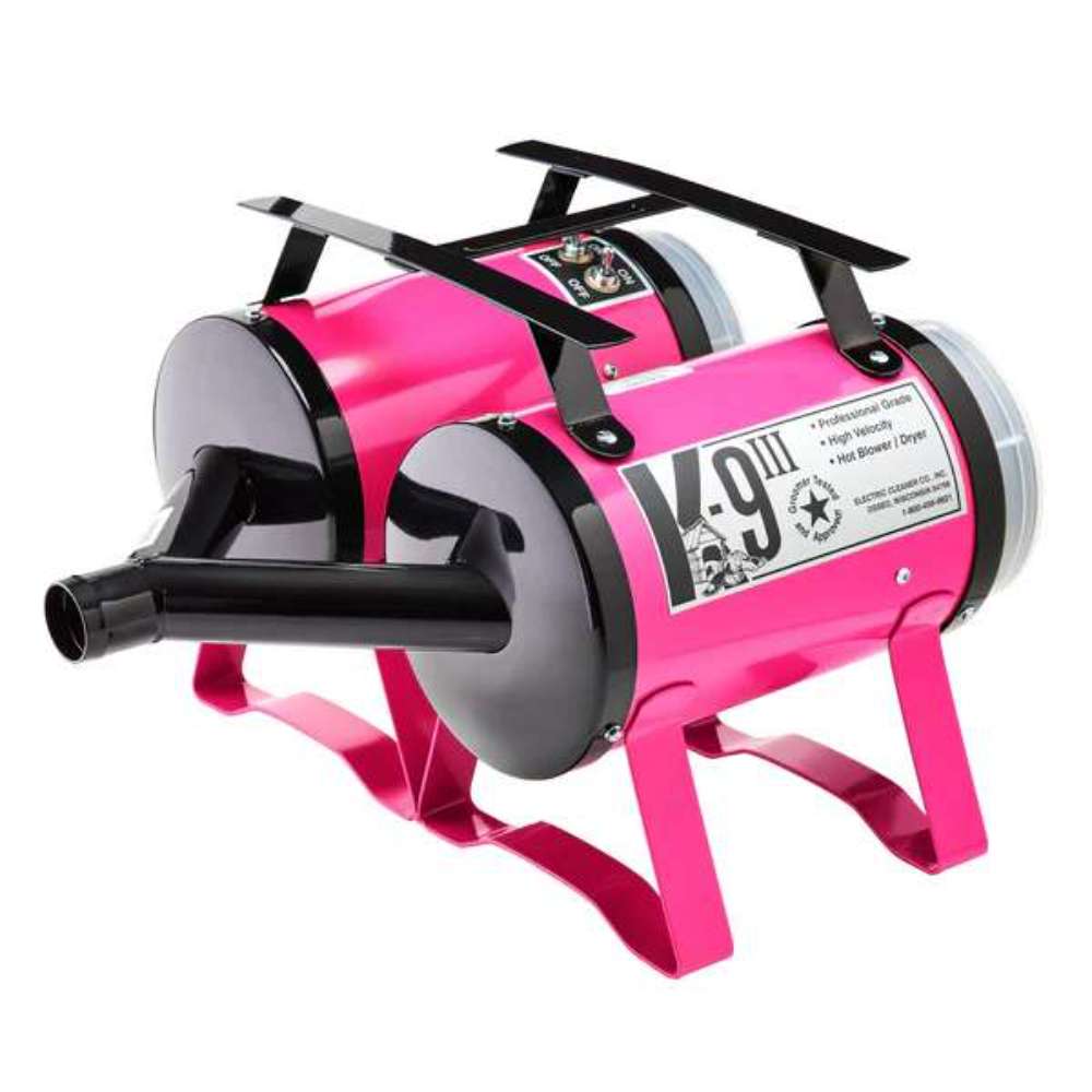 Pink K-9 III Dog Dryer features a vibrant pink metal body, front air nozzle, and sturdy support legs for grooming tasks