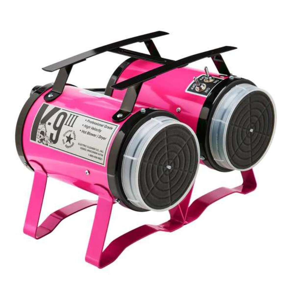 Pink K-9 III Dog Dryer has dual rear filters, black carrying handles, and a compact cylindrical design for high-velocity drying