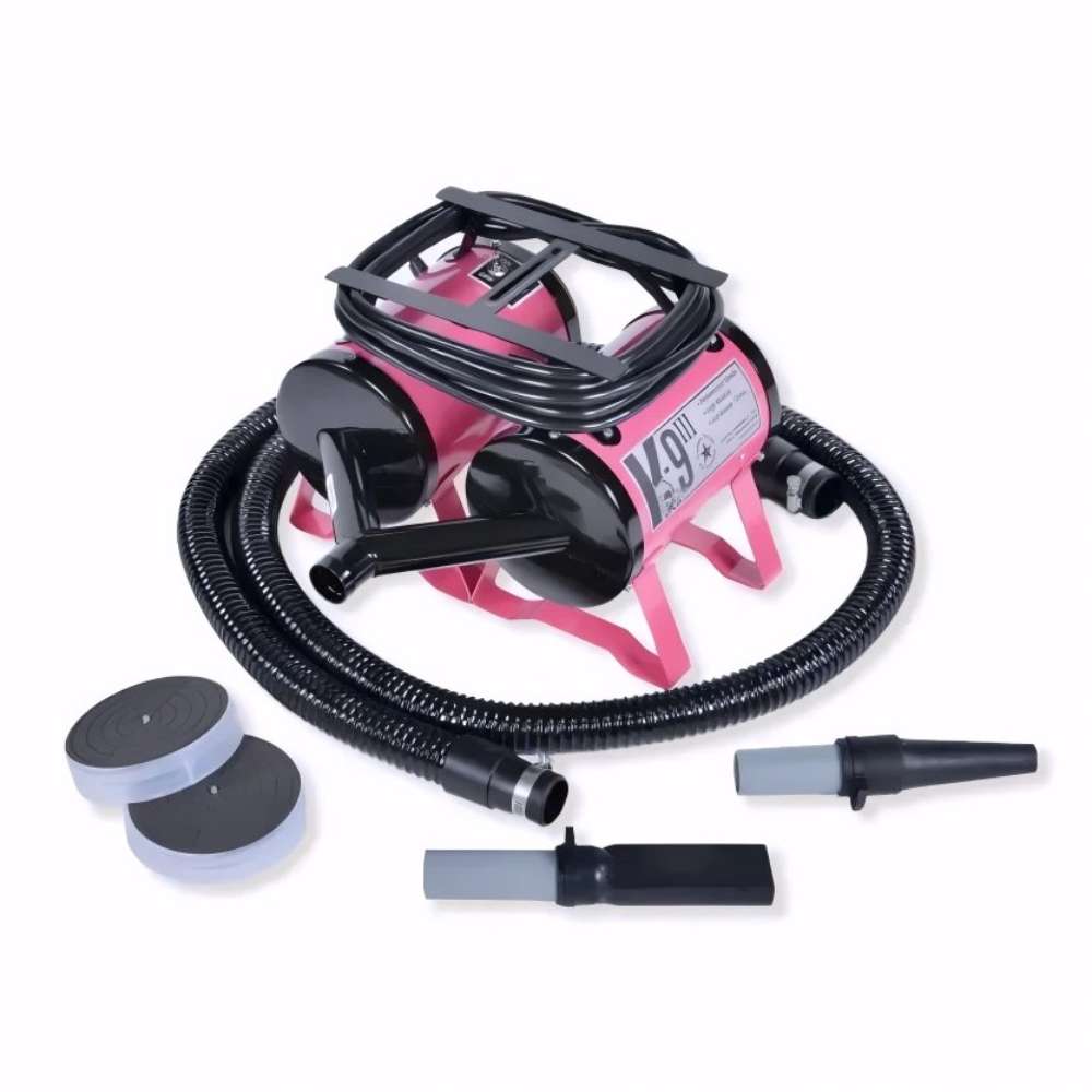 Pink K-9 III Dog Dryer includes flexible hoses, nozzle attachments, and removable filters placed beside the compact dryer unit