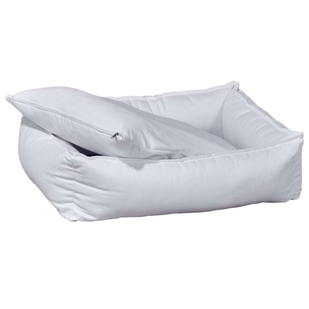 Pure White Bowsers B Lounge Dog Bed in bright white with a removable cushion partially lifted above the bed