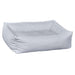 Pure White Bowsers B Lounge Dog Bed in bright white with a soft sleeping surface and raised cushioned edges