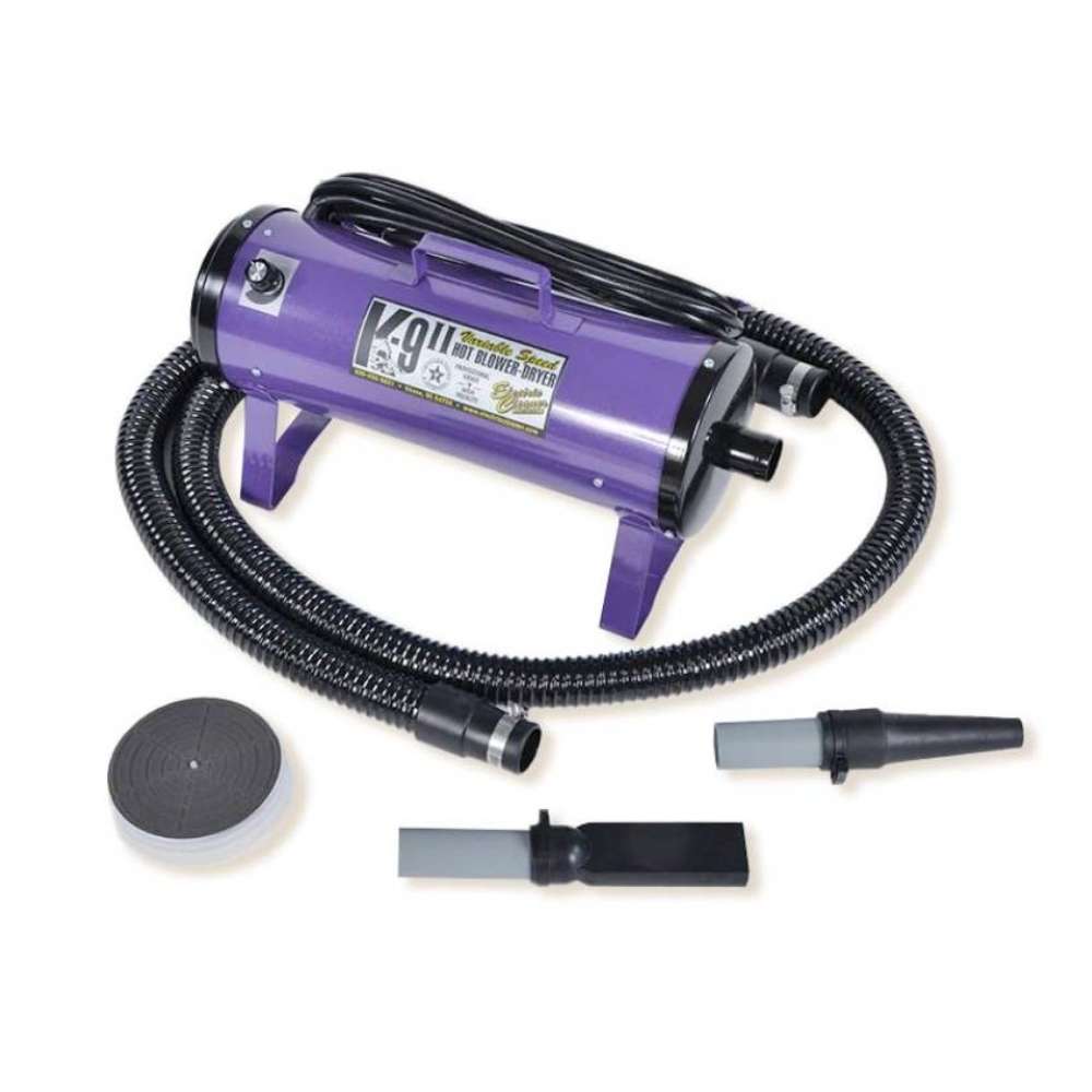 Purple K-9 II Variable Speed Dog Dryer includes a long flexible hose, detachable grooming attachments, and a compact body designed for high-powered drying