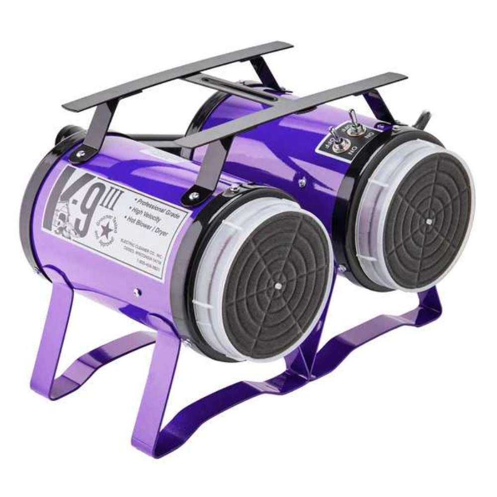 Purple K-9 III Dog Dryer has dual rear filters, black carrying handles, and a compact cylindrical design for high-velocity drying