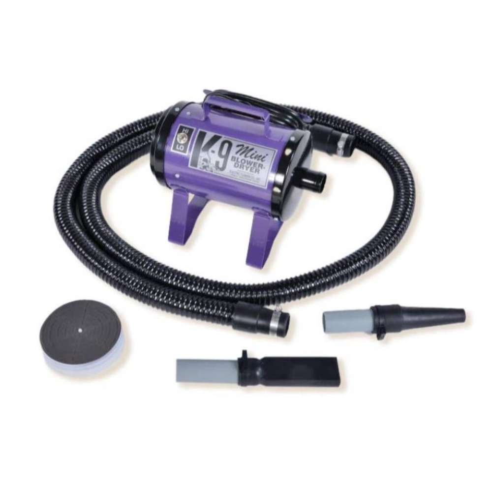 Purple K-9 Mini Dog Dryer features a deep purple body, long coiled hose, and nozzle tools for fast pet coat drying