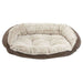 Rain Bowsers Crescent Reversible Dog Bed with a cream faux fur interior and warm taupe outer fabric for cozy comfort