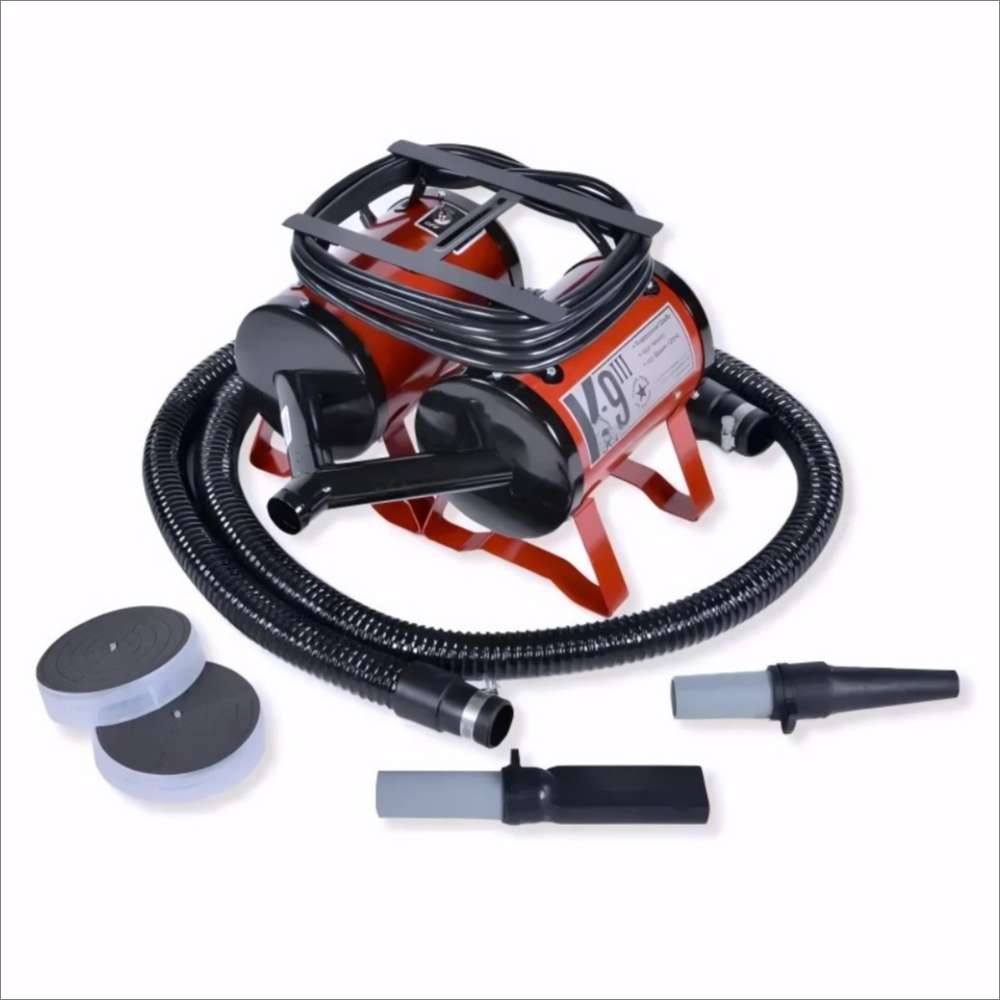 Red K-9 III Dog Dryer includes hoses, nozzle attachments, and removable filters arranged around the pet dryer unit for grooming use