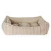 Sanibel Stripe Bowsers One Of A Kind Scoop Dog Bed features a striped beige and pink fabric with a soft cushioned base
