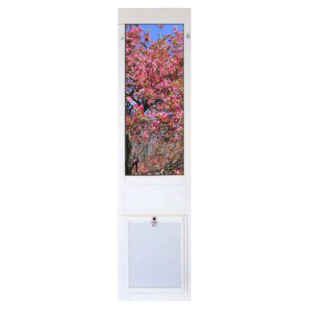 Security Boss Standard Lockable Patio Pet Door, showcasing blooming tree through the window