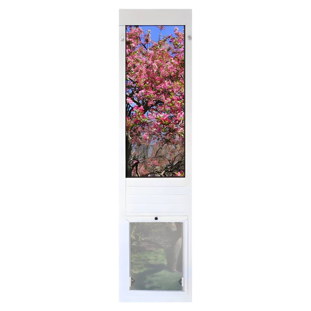 Security Boss Standard Lockable Patio Pet Door installed in a window frame with a blooming tree visible through the glass