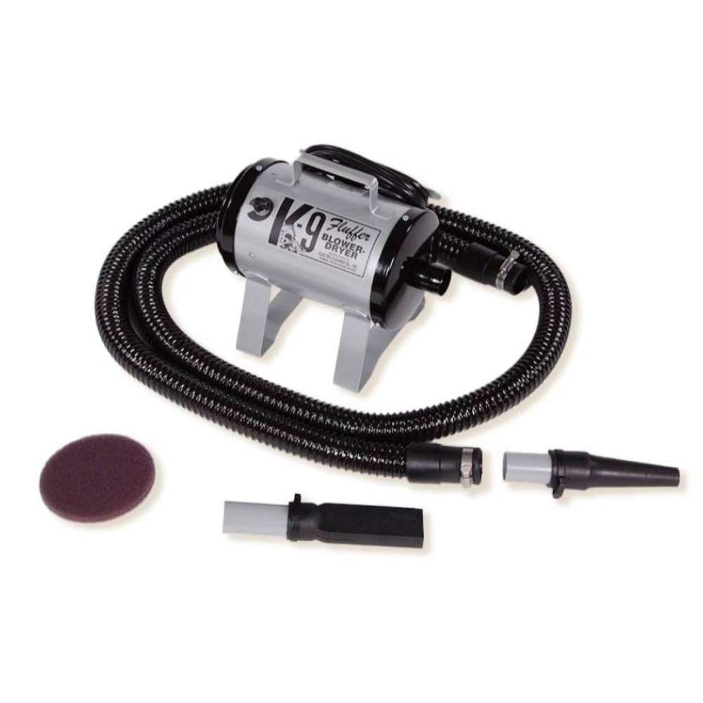 Silver K-9 Fluffer Dryer with a flexible hose and grooming accessories is shown against a plain white background