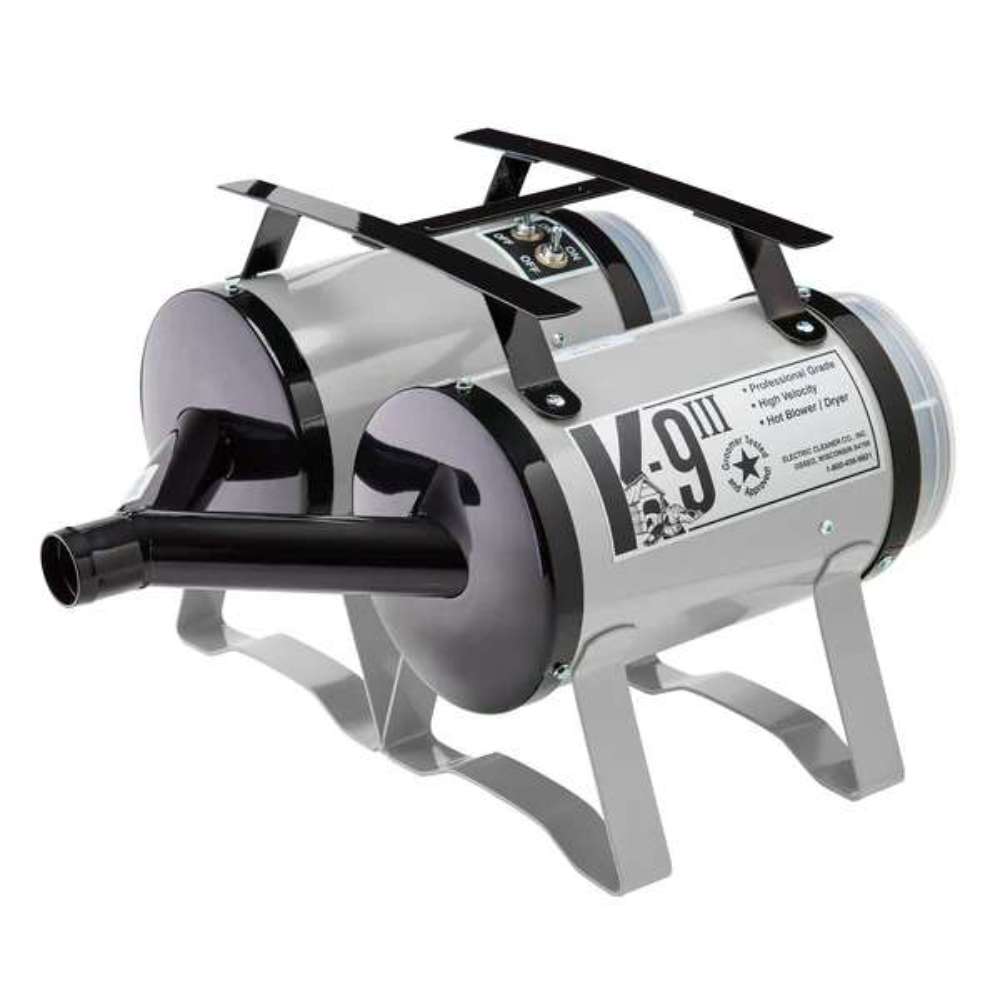 Silver K-9 III Dog Dryer features a glossy silver metal body, front air nozzle, and elevated legs for portable pet grooming