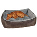 Small brown dog curls up asleep inside the cushioned gray Bowsers B Lounge Dog Bed with supportive bolstered edges