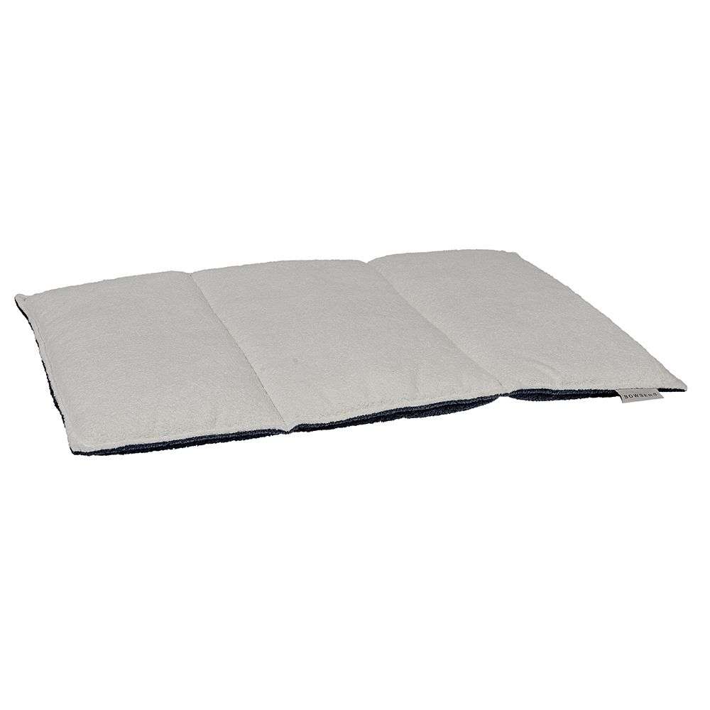 Soft cream Stormberry Bowsers Urban Home & Travel Mat is displayed with a dark blue underside, highlighting its reversible design