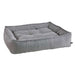Stone Grey Bowsers Sterling Lounge Dog Bed in neutral gray features thick padded walls and a cozy tufted center cushion