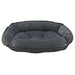 Storm Bowsers Crescent Reversible Dog Bed with a smooth charcoal plush cushion and textured dark gray outer trim