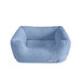 The Hello Doggie Baby Dog Bed in Baby Blue offers a serene and relaxing space for pets, with its soft fabric and cushioned structure