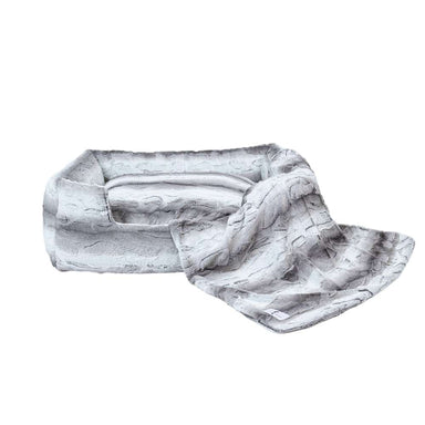 The Hello Doggie Big Baby Bed in angora color comes with a coordinating blanket, featuring a luxurious faux fur texture