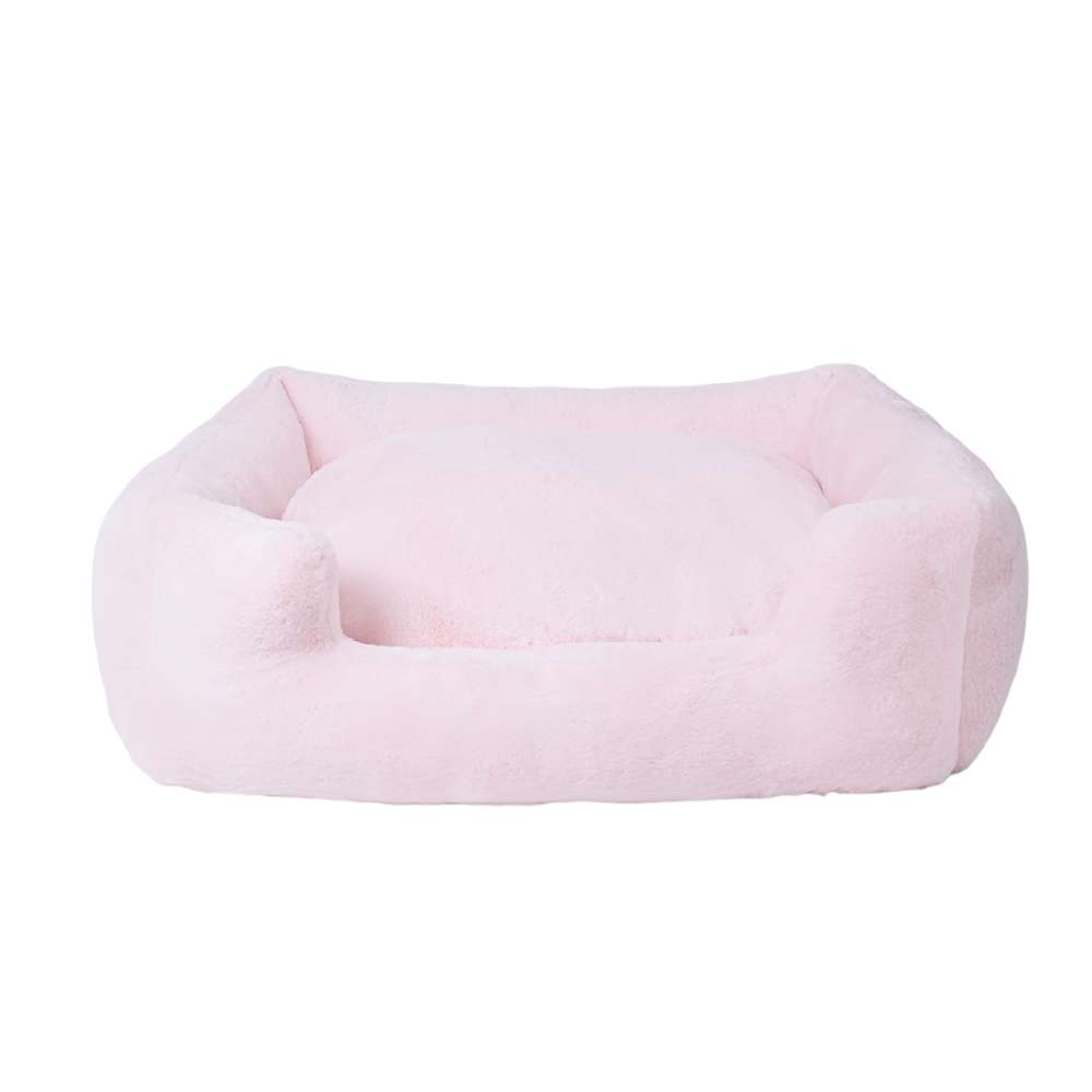 The Hello Doggie Big Baby Bed in ice pink color features a soft and cozy design with raised edges and a plush interior, providing comfort and security for pets