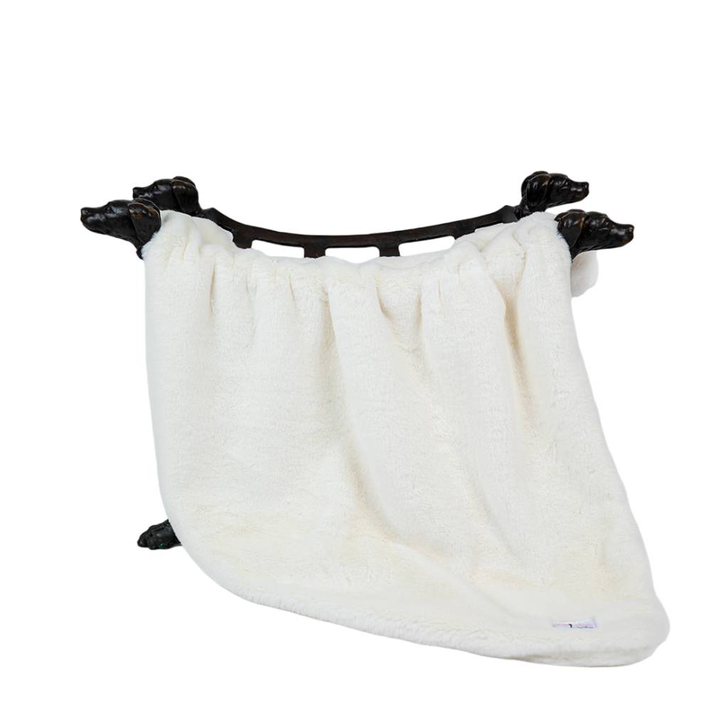 The Hello Doggie Big Baby Dog Blanket in natural is shown on a stand with four dog-shaped legs, highlighting its soft, beige color