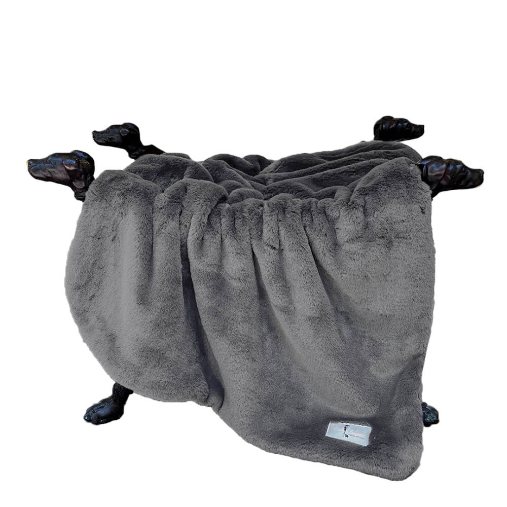 The Hello Doggie Big Baby Dog Blanket in pewter is displayed hanging on a stand with four dog-shaped legs, featuring its plush, grey material
