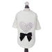 The Hello Doggie Oh My Heart Dog Tee is shown on a mannequin, featuring a white tee with a large crystal heart and a black bow on the back