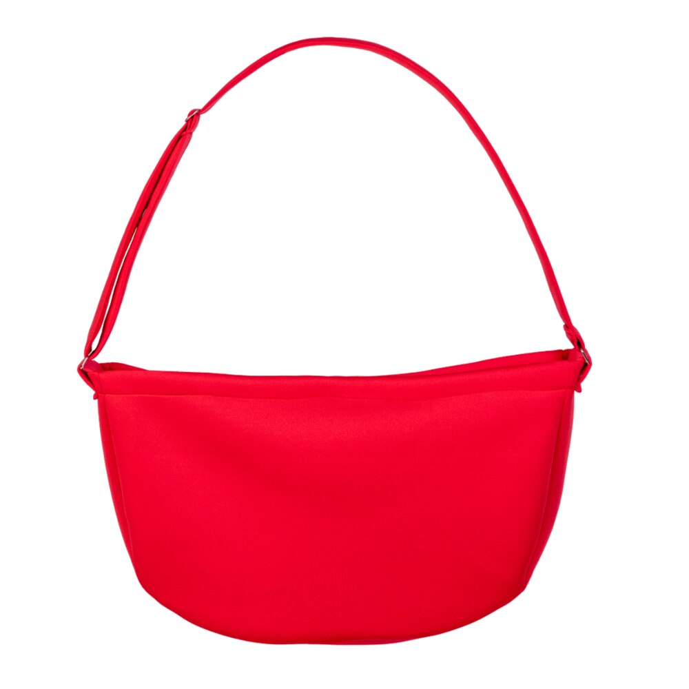 The Hello Doggie Signature Sling Dog Carrier in a striking red color provides a stylish and functional way to carry your small pet comfortably