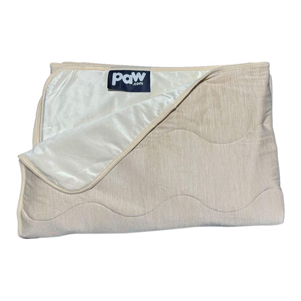 The Paw PupChill™ Cooling Waterproof Blanket - Arctic Sand is shown folded with a visible paw.com label