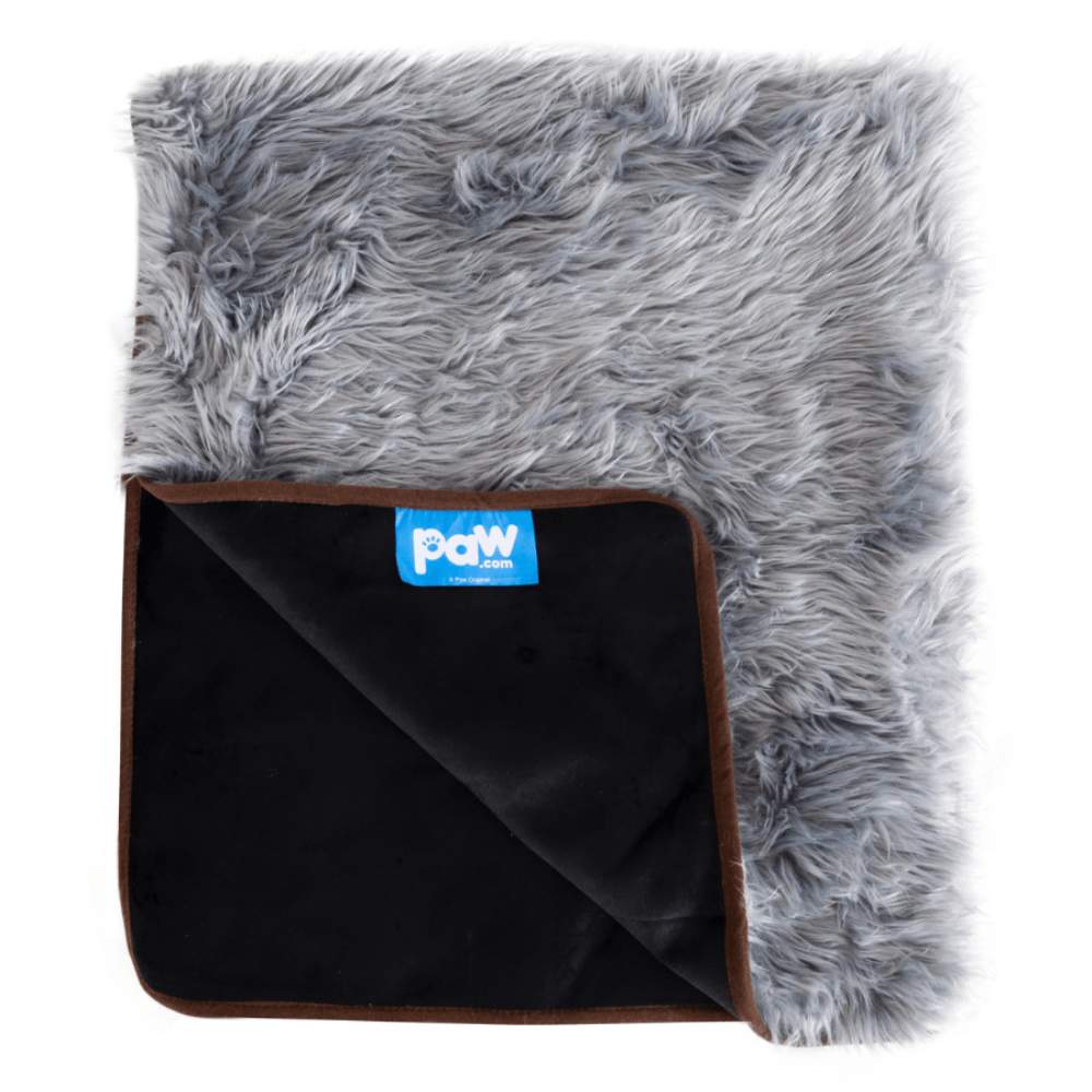 The Paw PupProtector™ Waterproof Throw Blanket - Charcoal Grey is shown folded to reveal its black underside