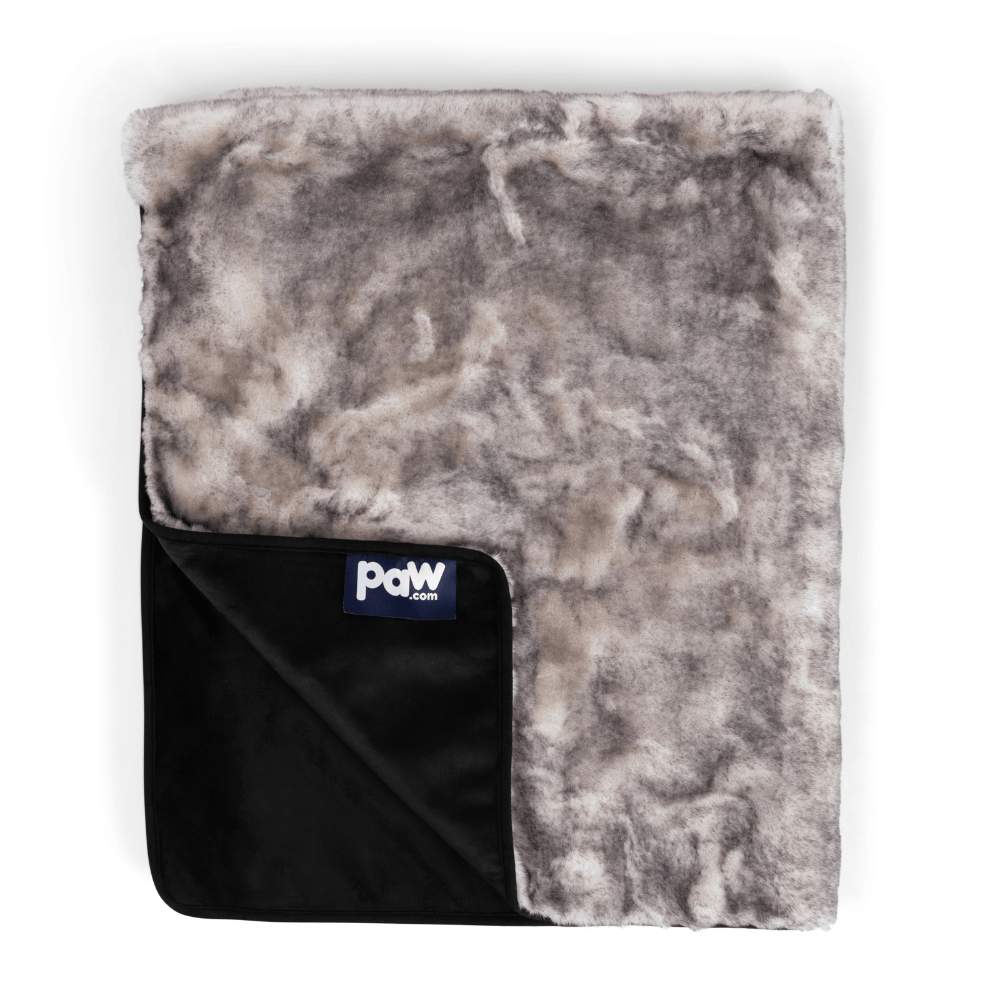 The Paw PupProtector™ Waterproof Throw Blanket - Ultra Soft Chinchilla is displayed with its underside showing the label