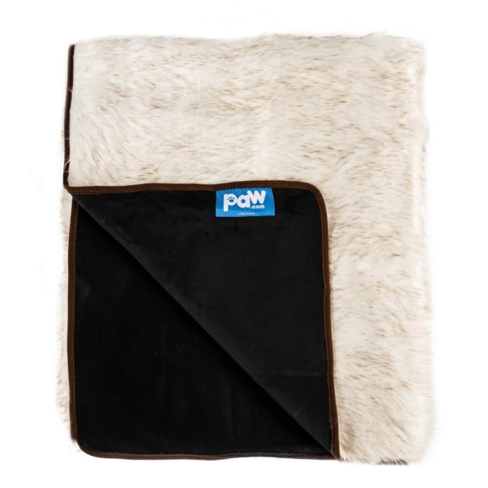 The Paw PupProtector™ Waterproof Throw Blanket - White with Brown Accents is displayed with its black waterproof backing shown