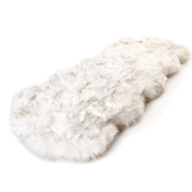 The Paw PupRug™ Runner Faux Fur Memory Foam Dog Bed Curve White with Brown Accents displayed on its own, showcasing its plush texture