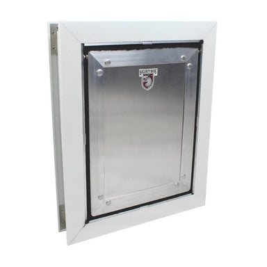 The Security Boss SB72 Bite Resistant Door Mount Pet Entrance with a sturdy metallic flap, designed for durability and pet safety, mounted on a white door frame