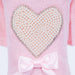 The close-up of the Hello Doggie Pearl Heart Dog Sweater in pink color highlights the delicate pearl heart embellishment accompanied by a pink bow