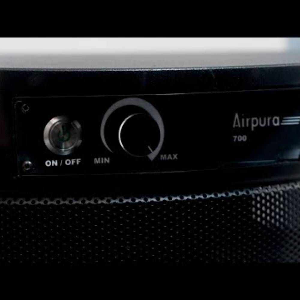 The close-up of the control panel on Airpura R700 - The Everyday Clean Air Purifier highlights its easy-to-use onoff switch and adjustable settings