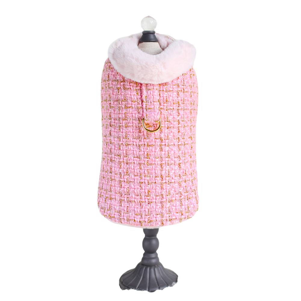 The full front view of the bubblegum pink tweed coat for dogs, complete with a fur-trimmed collar and gold ring, is referred to as the Hello Doggie Chantel Tweed Dog Coat