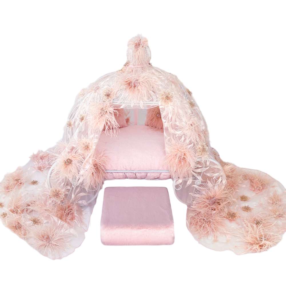 The full view of the Hello Doggie Dolce Vita Dog Bed showcases a luxurious pink canopy bed adorned with numerous floral decorations and a matching footrest