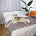 The husky appears happy and at ease on the bed with the Paw PupProtector™ Waterproof Bed Runner - Ultra Soft Chinchilla