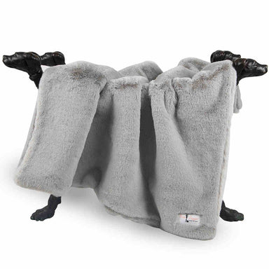 The image depicts a soft dove grey Hello Doggie Divine Plus Dog Blanket neatly arranged on a stand featuring dog head ornaments