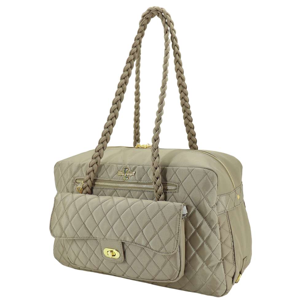 The image depicts a tan quilted handbag with braided handles and a front pocket, called the Hello Doggie Porsha Dog Carrier