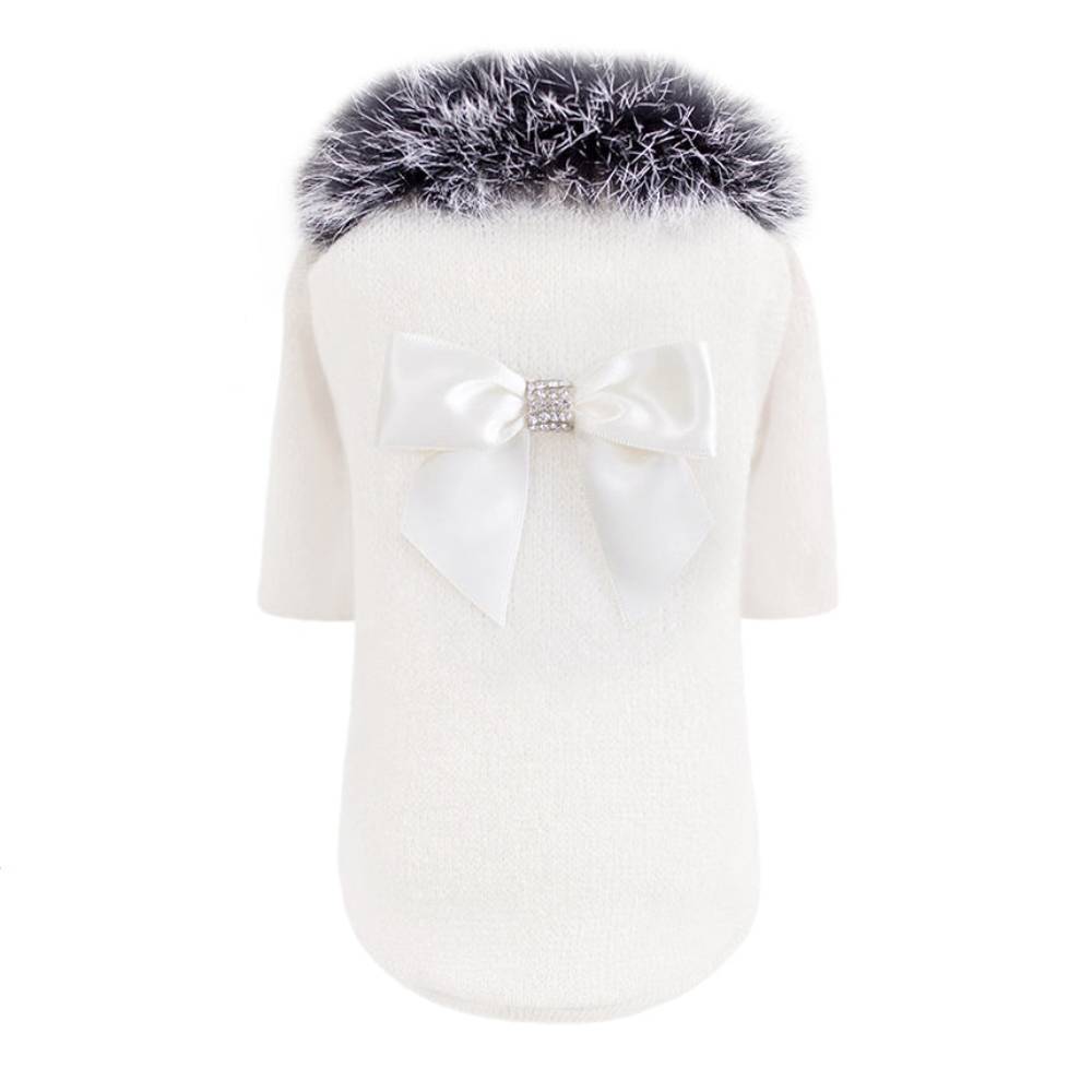 The image depicts the Hello Doggie High Society Dog Sweater from the back, clearly showing the cream fabric, fluffy black collar, and the white bow with a jeweled center