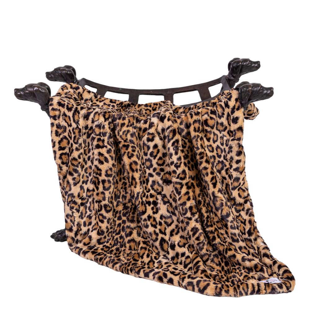 The image displays a Hello Doggie Cashmere Dog Blanket with a leopard print pattern elegantly draped over a black dog-shaped holder