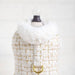The image displays a chic cream tweed dog coat with a white fur collar, described as the Hello Doggie Chantel Tweed Dog Coat